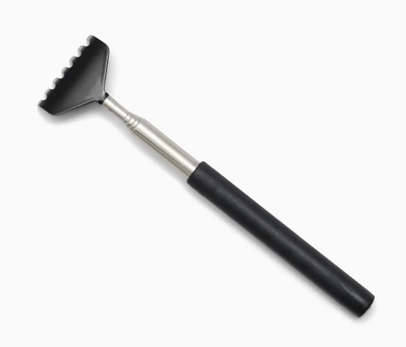 Black and silver massage tool on a white background