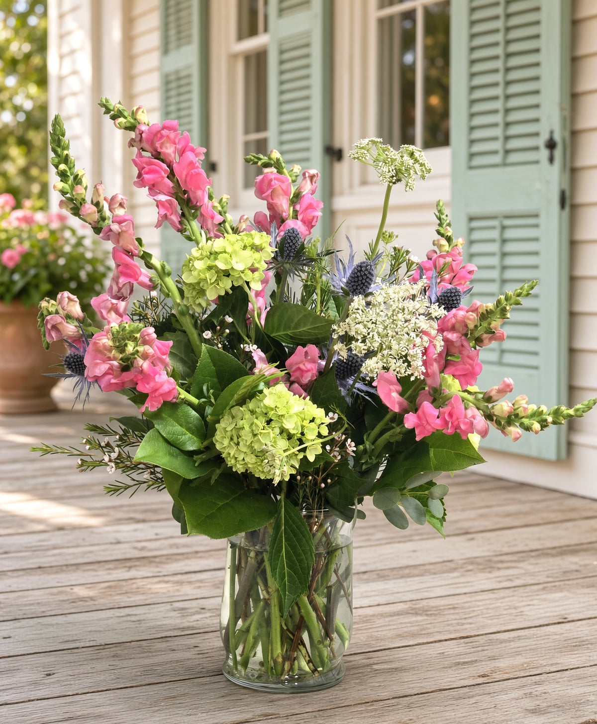Windswept Garden - A Bright Arrangement Of Pink Snapdragons and Fresh Greens